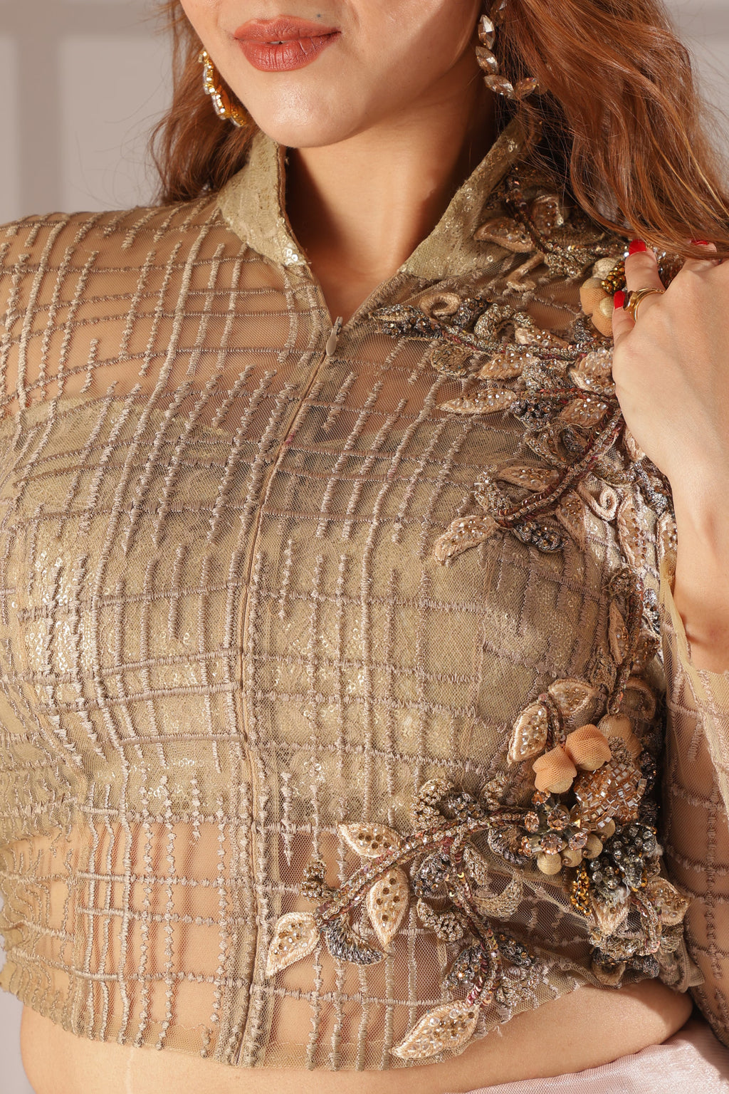 Champagne Blush Floral Net Lehenga & Gold-Grid Embellished Full-Sleeve collar blouse