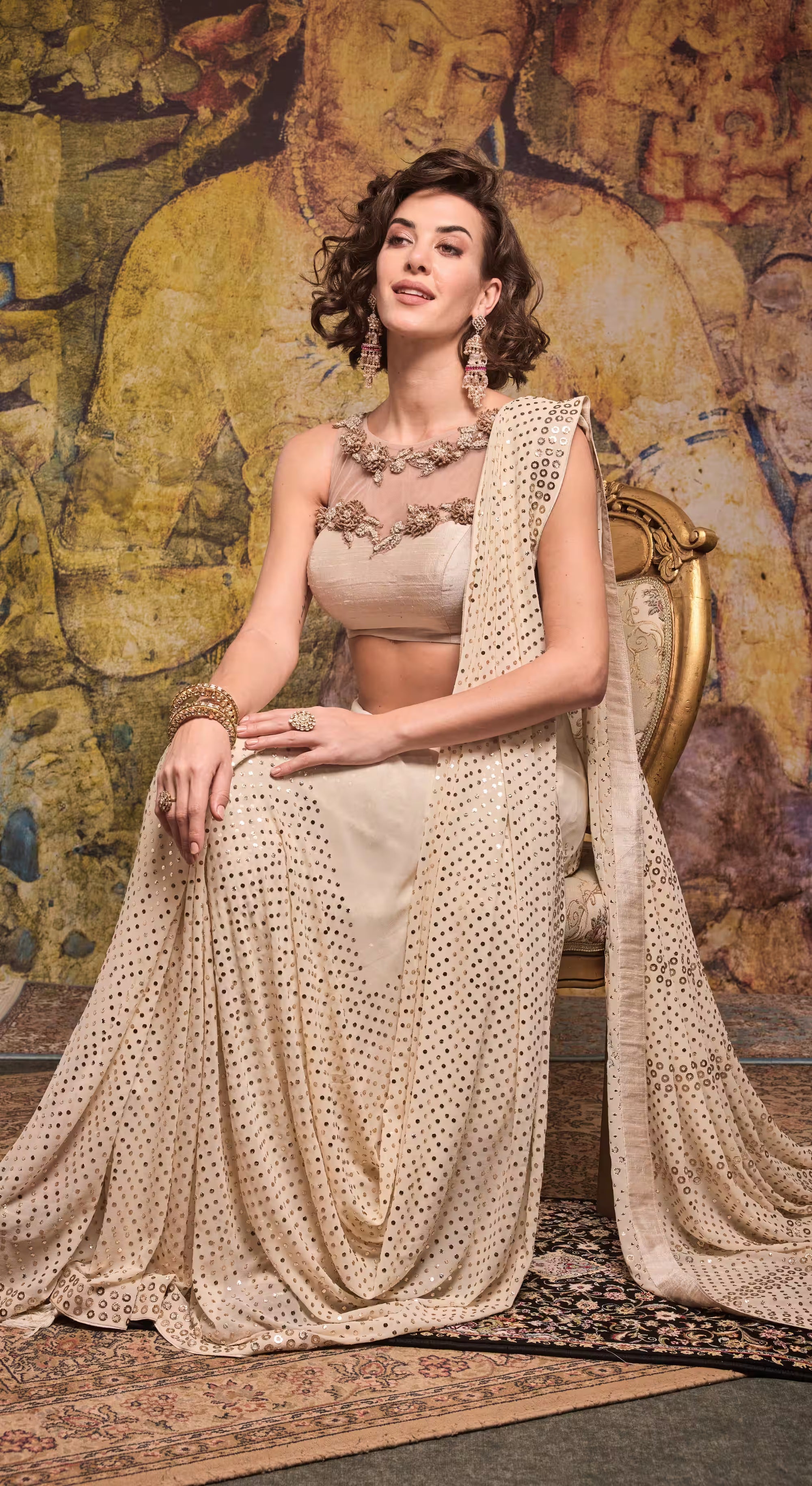 Mirror-Embellished Champagne Georgette Saree with Embroidered Net Blouse