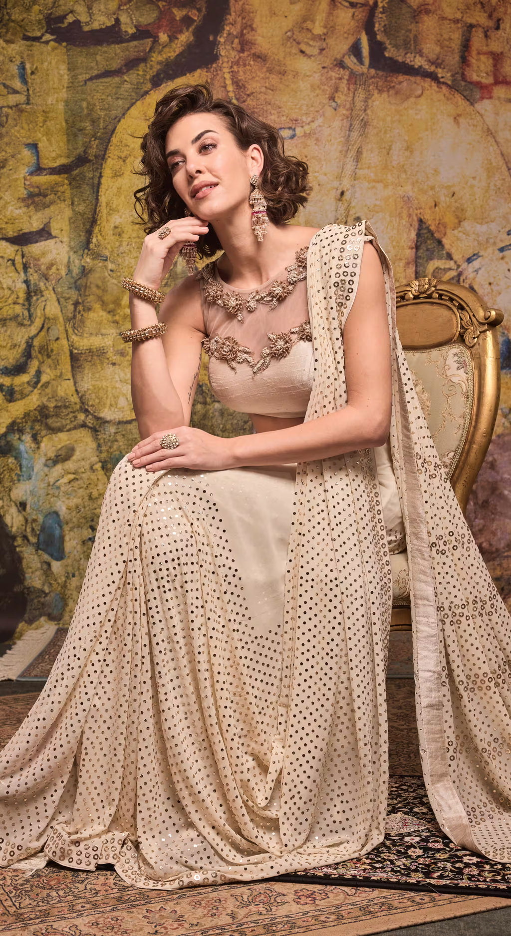 Mirror-Embellished Champagne Georgette Saree with Embroidered Net Blouse