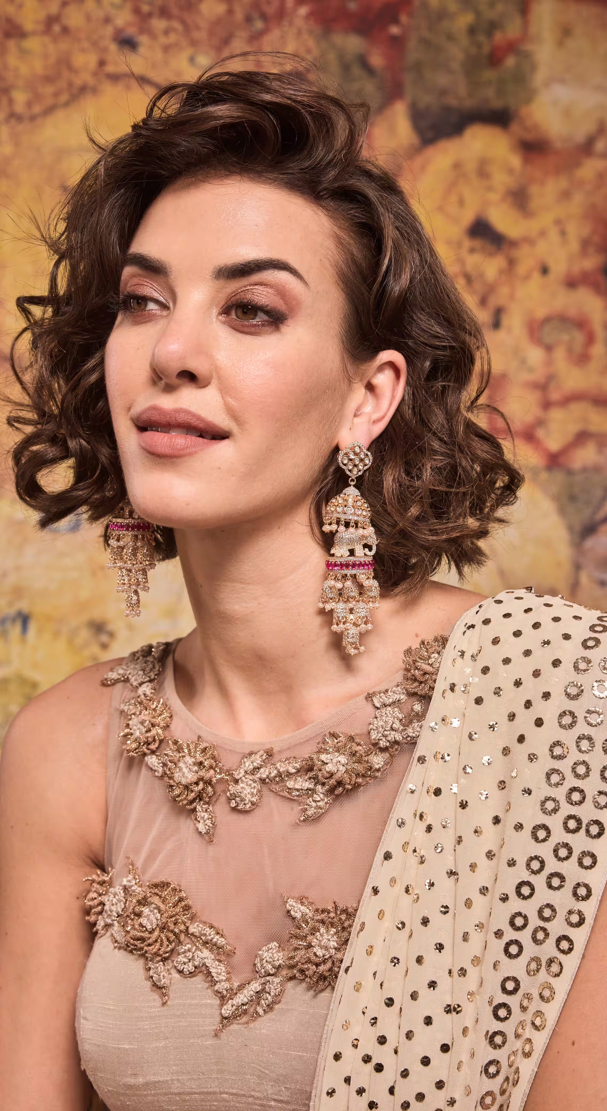 Mirror-Embellished Champagne Georgette Saree with Embroidered Net Blouse